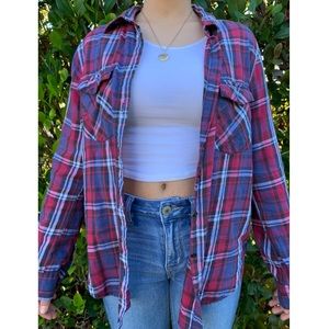 red, white, and navy blue plaid flannel